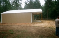 30x30x10, 10' extended roof line 20' lean-to. Saddle tan walls, white roof and trim.