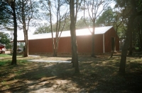 40x60x10, 20' extended roof line, rustic red walls, white roof and trim